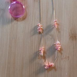 salmon coral on gold chain necklace